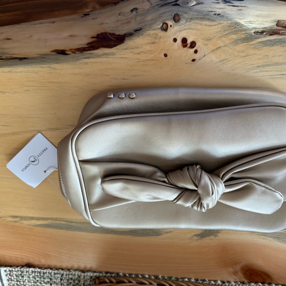 Chic Cream Knot Cosmetic Bag